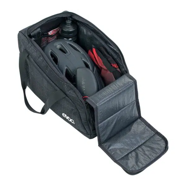 EVOC Gear Bag 20 black open with cycling stuff inside