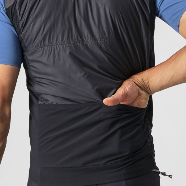 Castelli Unlimited Puffy Vest hand in back pocket closeup