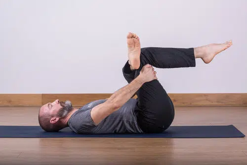 Man Performing Figure 4 Stretch