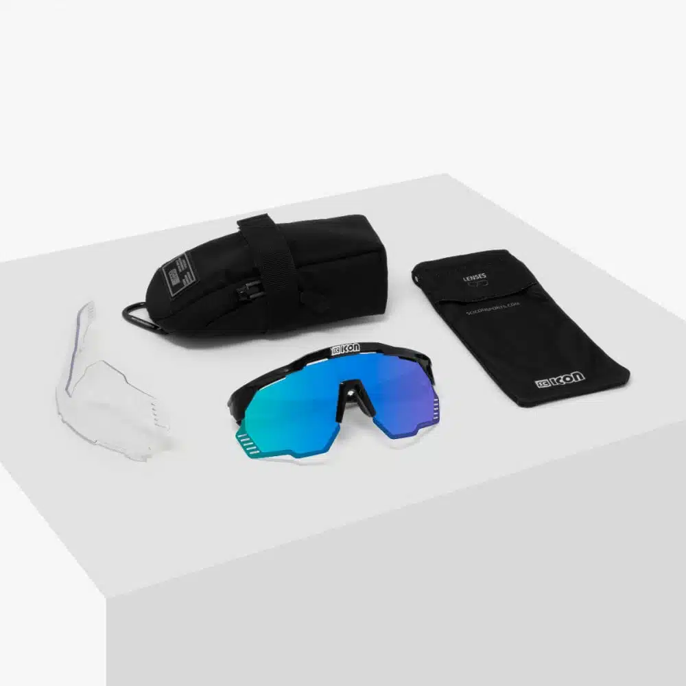 Scicon Aeroshade Kunken Sunglasses Cyrstal Multimirror blue on table