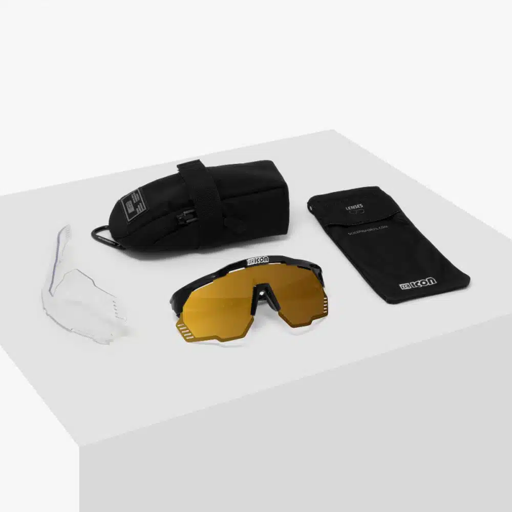 Scicon Aeroshade Kunken sunglasses black multimirror bronze on table