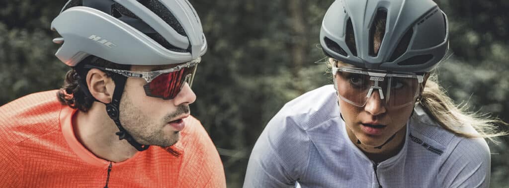 Scicon eyewear banner image of two riders wearing the glasses