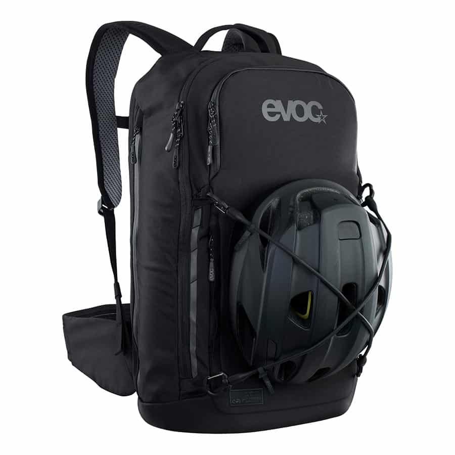 EVOC Commute Pro 22 Backpack angle with helmet