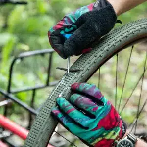 Park Tool TPT-1 Tubeless Repair Tool in action on the side of the trail