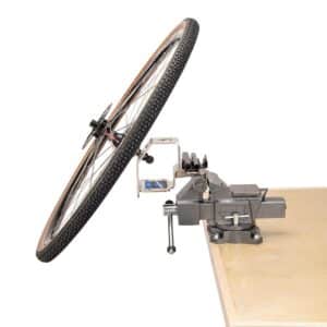 Park Tool WH-1 Wheel Holder in a vice on bench