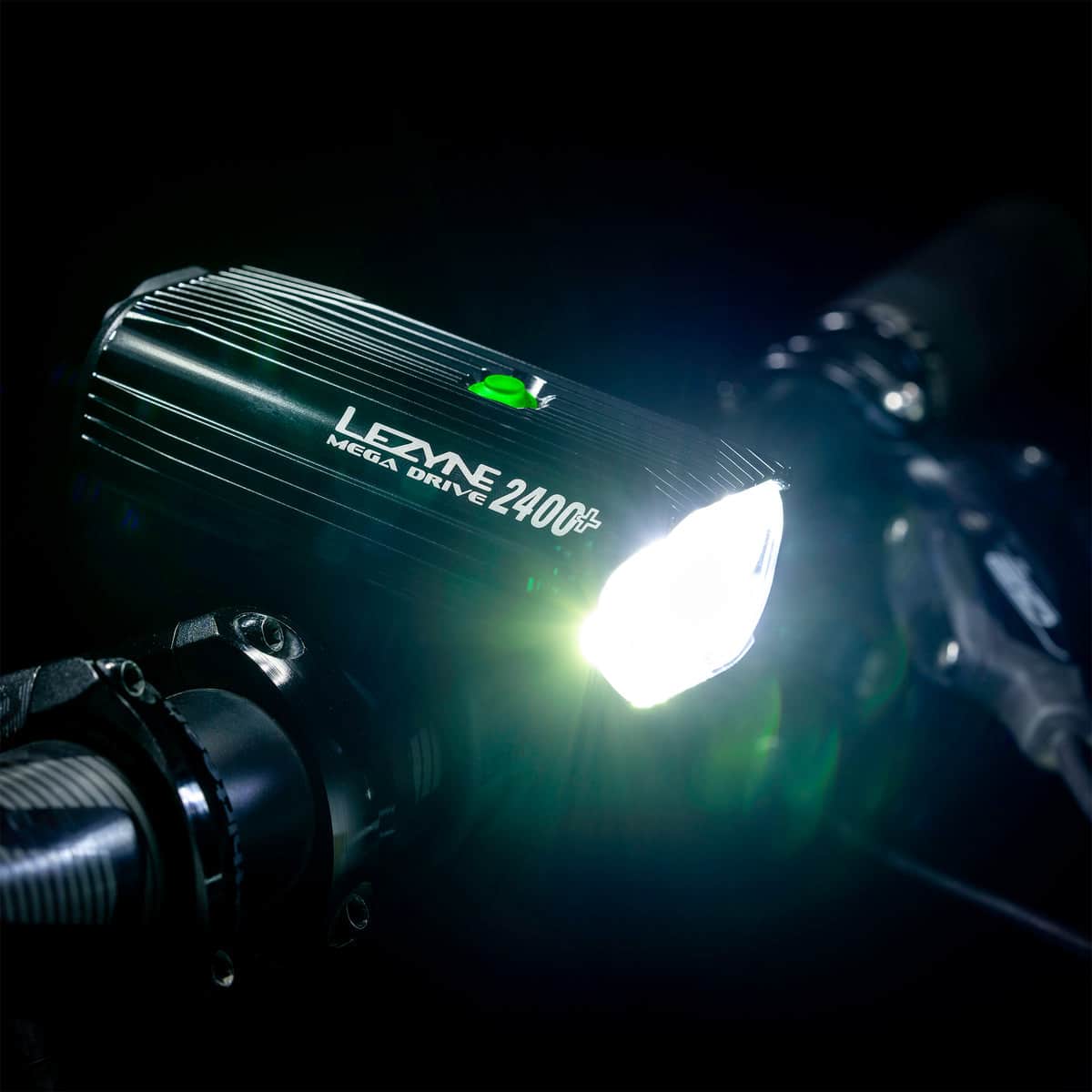 LEZYNE Mega Drive 2400+ Front attached to handlebar with light on and close up