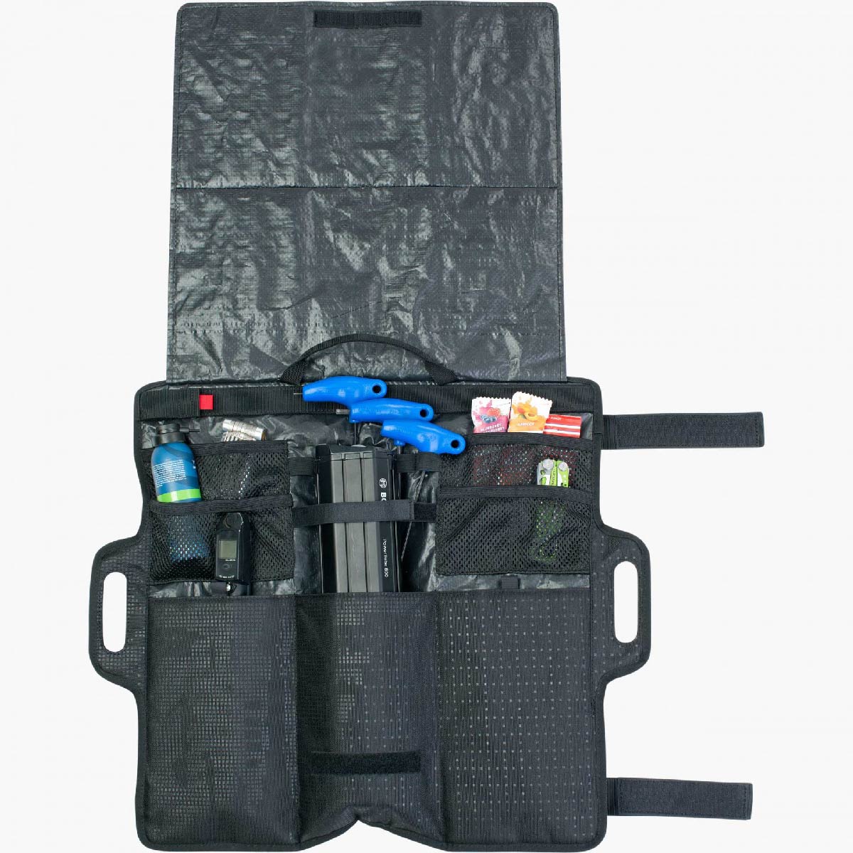 EVOC Gear Wrap medium open with tools and accessories inside