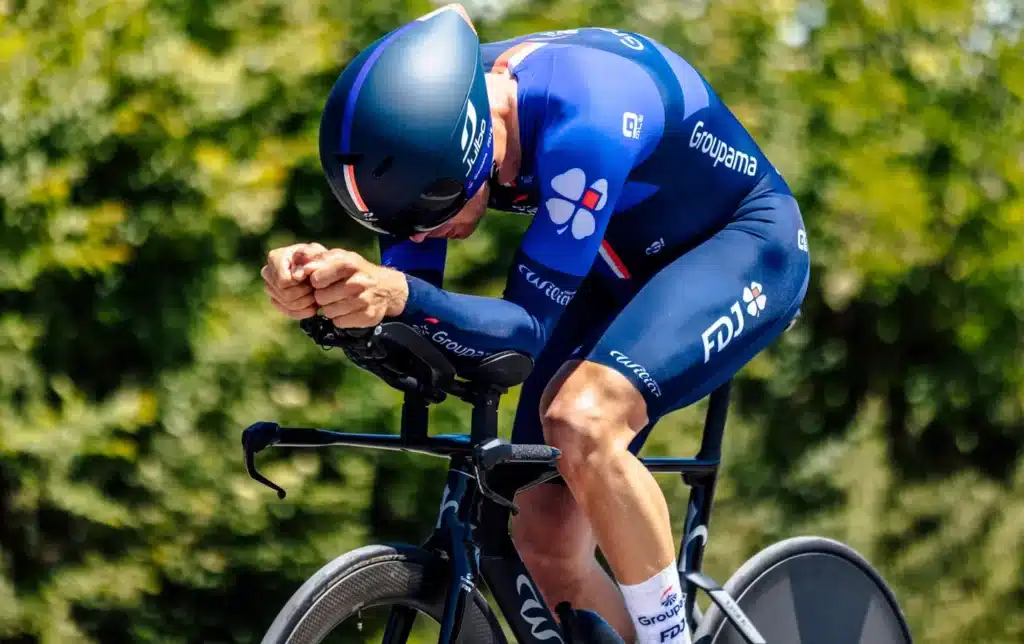 A cyclist practicing his cycling aerodynamics