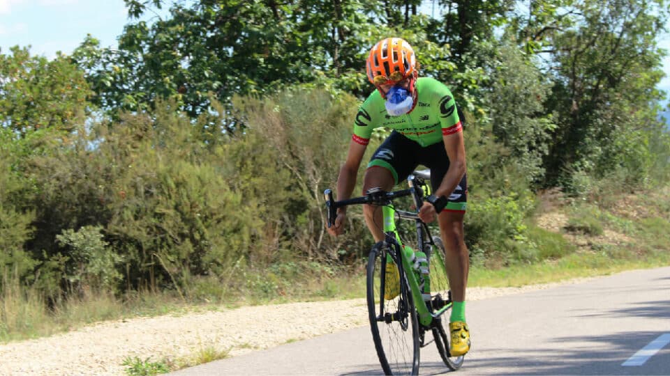 Cyclist with VO2 face mask