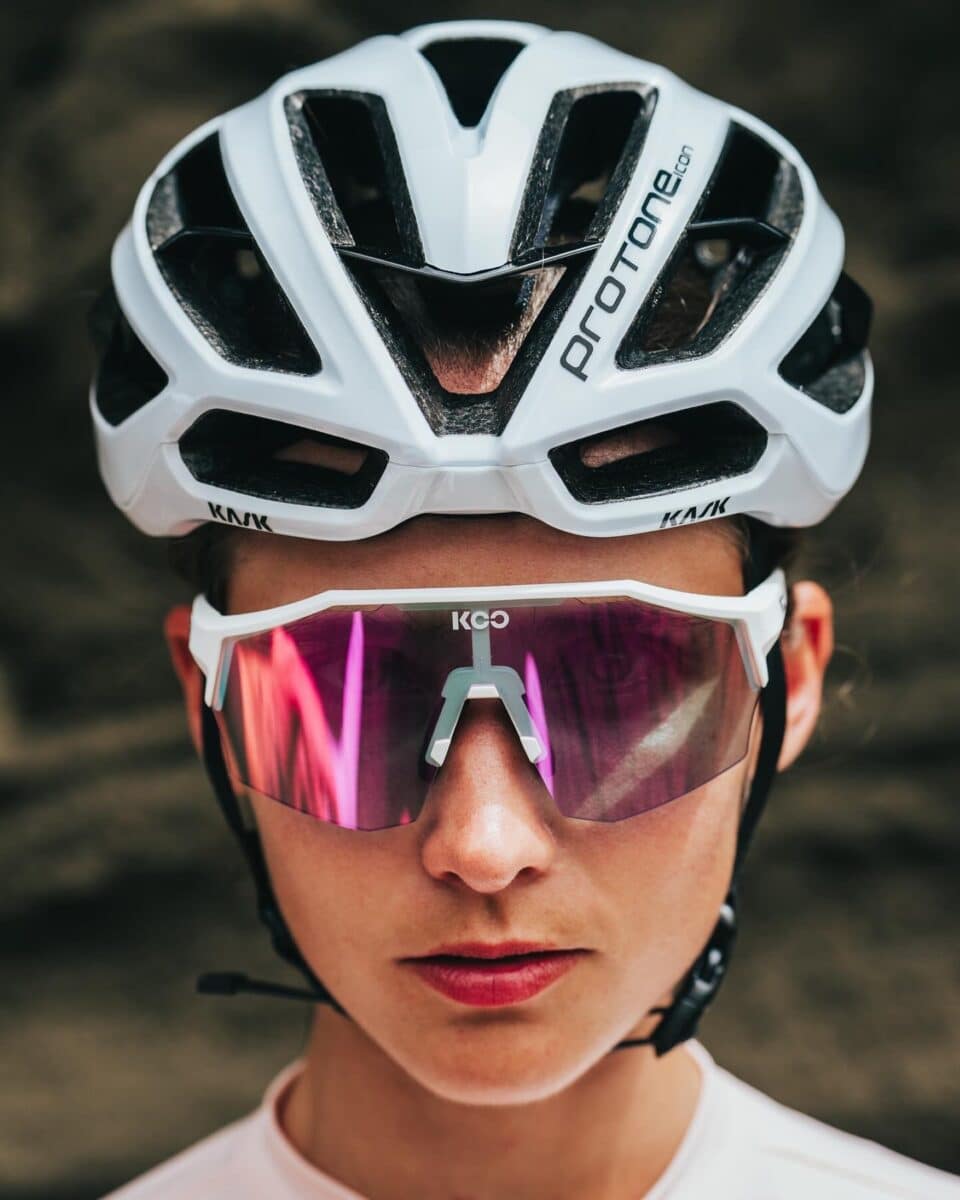 cyclist wearing the Koo Demos photochromic cycling sunglasses