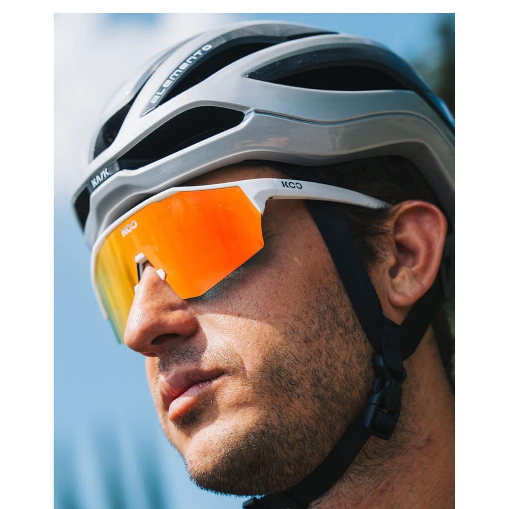 Koo Alibi Large Sunglasses on cyclist with Elemento helmet